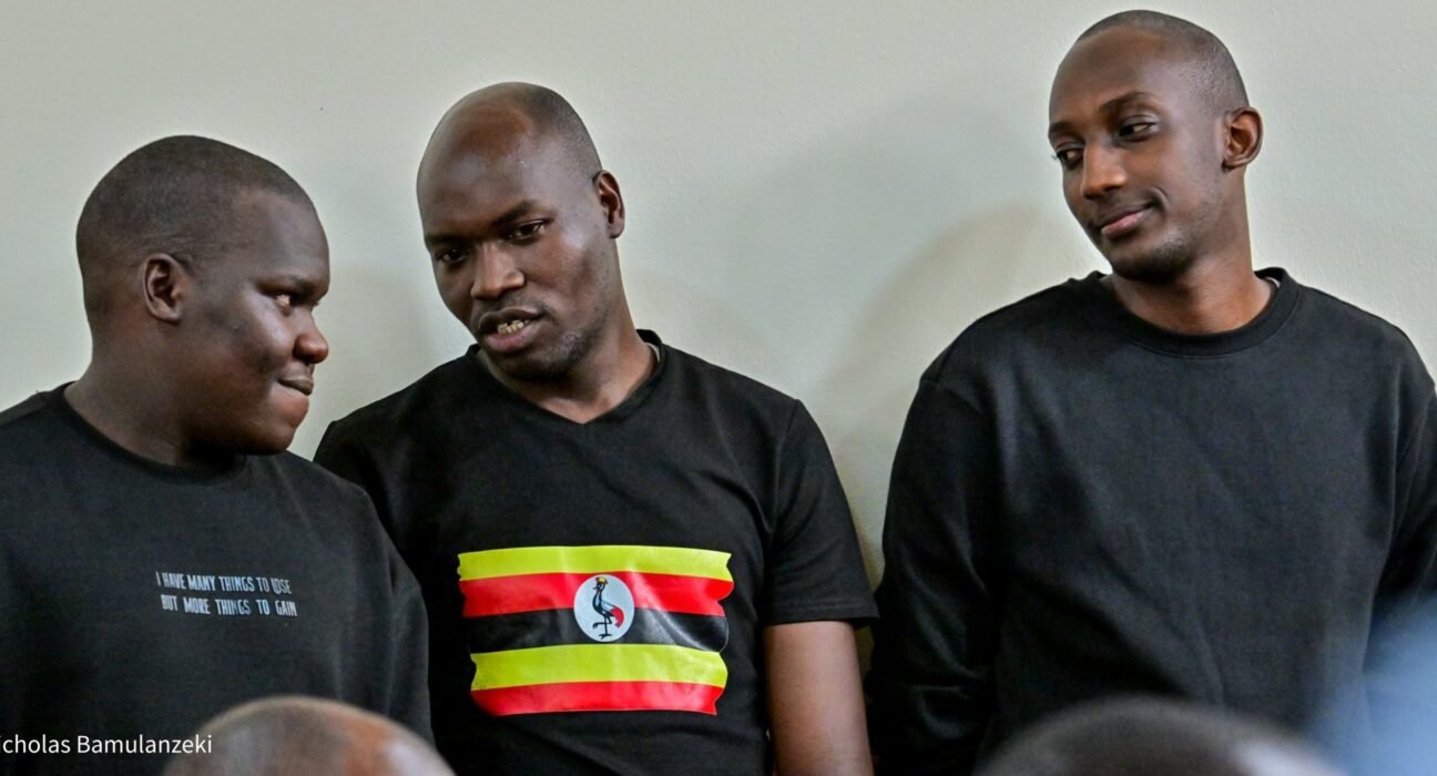 Baron Edgar, Bernard Ewalu and Thomas Kanzira in court. (Photo By Nicholas Bamulanzeki)